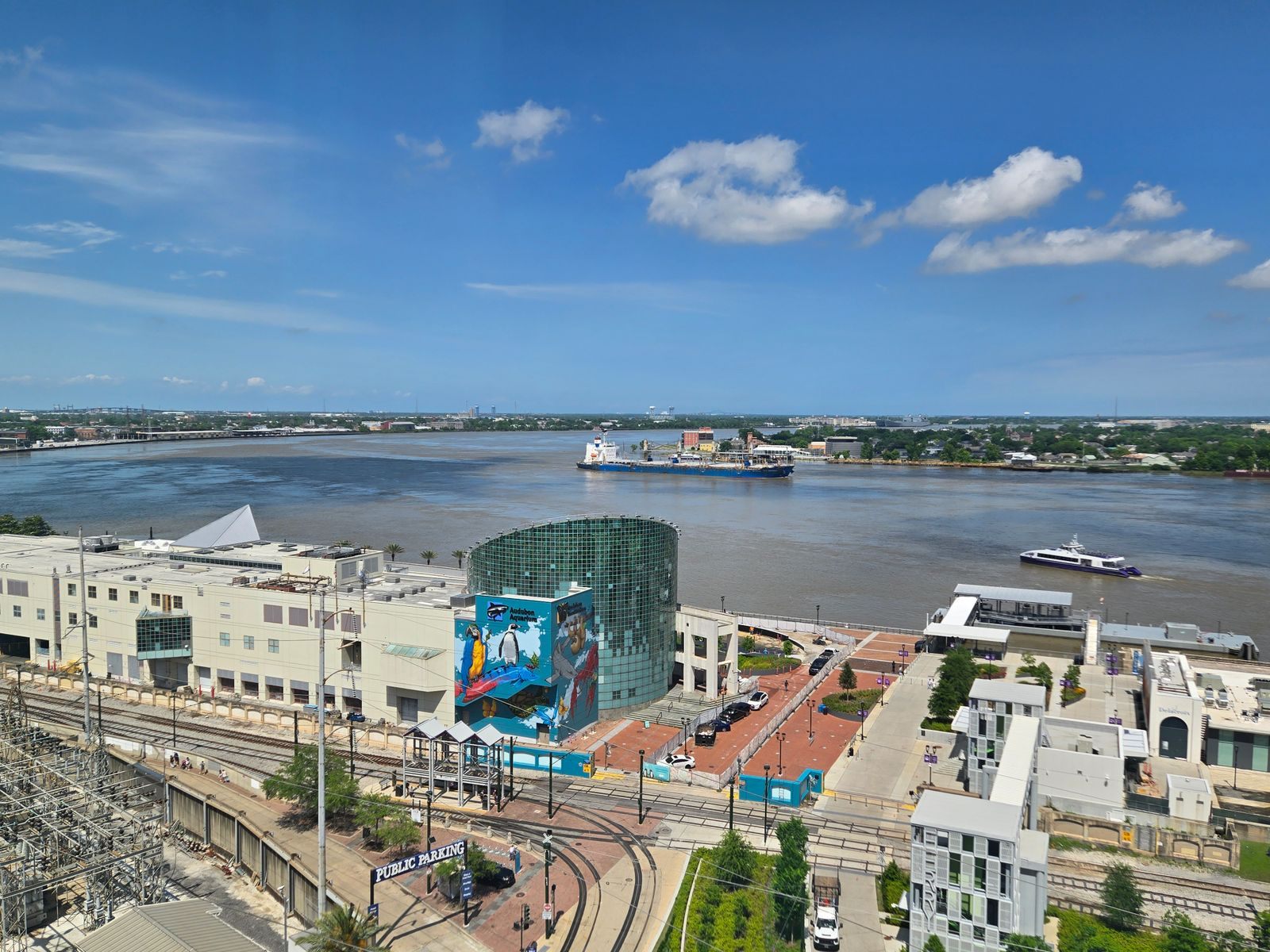 Aerial view of the Mississippi River curving past New Orleans, the start of most lower Mississippi river cruises